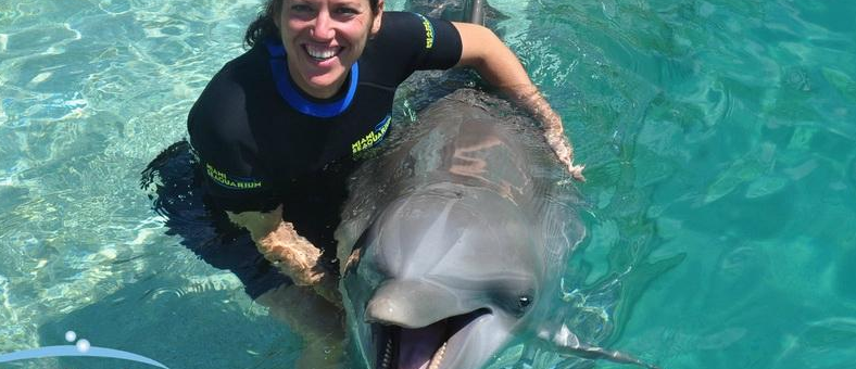 single_girl_dolphin_hold_miami_fl